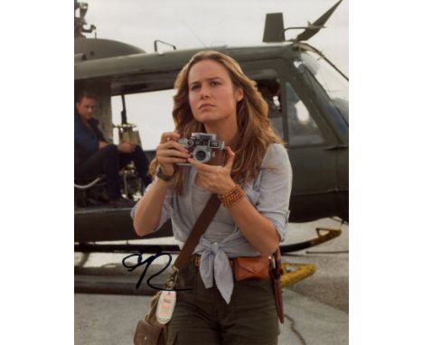 LARSON BRIE: (1989-     ) American actress, Academy Award winner. Signed colour 8 x 10 photograph of Larson standing in a thr