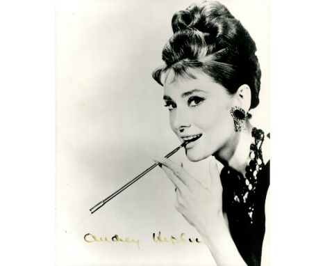 HEPBURN AUDREY: (1929-1993) Belgian-born British actress, Academy Award winner. Signed 8 x 10 photograph of Hepburn in a clas