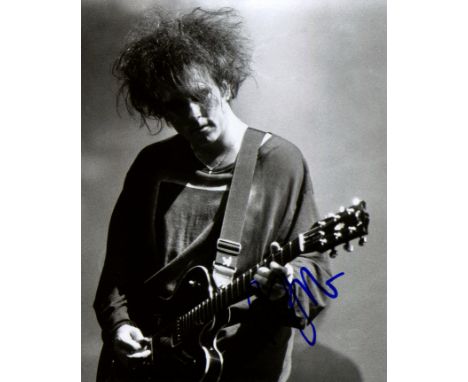 SMITH ROBERT: (1959- ) English musician, co-founder of the English rock band The Cure. Signed 8 x 10 photograph of Smith stan
