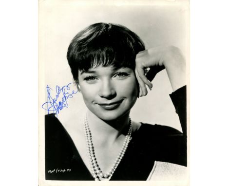 MACLAINE SHIRLEY: (1934-     ) American actress, Academy Award winner. Signed 8 x 10 photograph, an appealing original public