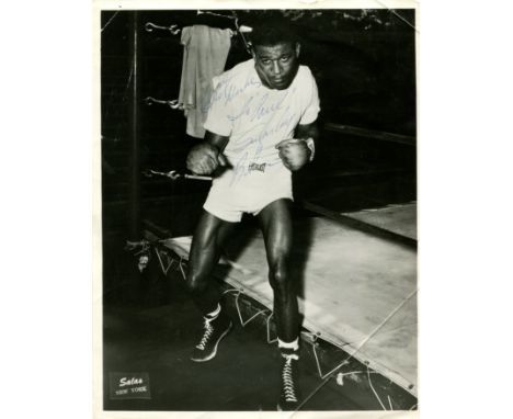 ROBINSON SUGAR RAY: (1921-1989) American boxer, World Welterweight Champion 1946-50, World Middleweight Champion 1951, 1951-5