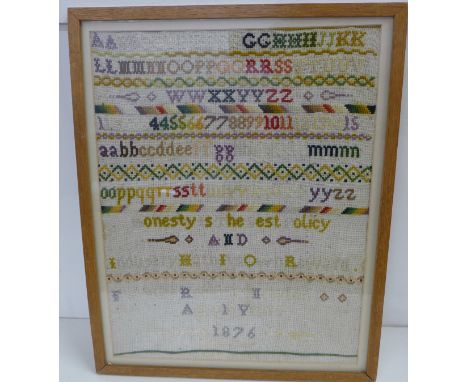 A framed sampler, Florence Robinson Hawton, 1876 