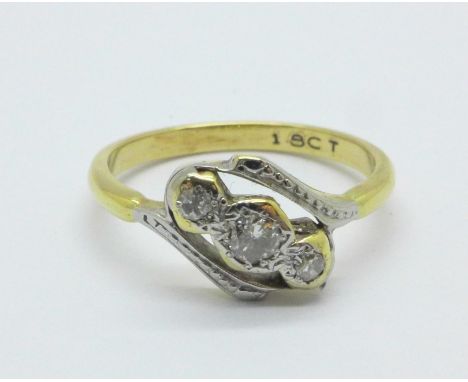 An 18ct gold, diamond crossover ring, 2.9g, M 