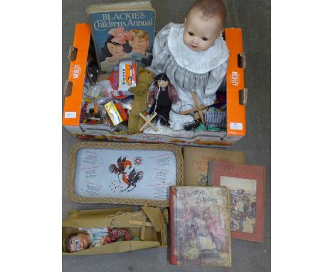 A box of assorted items including die-cast vehicles, Teddy bear, children's books, puppet etc. 