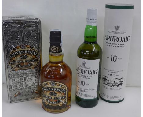 Two bottles of vintage Scotch whisky; Chivas Regal (12 years) Premium in commemorative 200th Anniversary tin, 2001 and Laphro