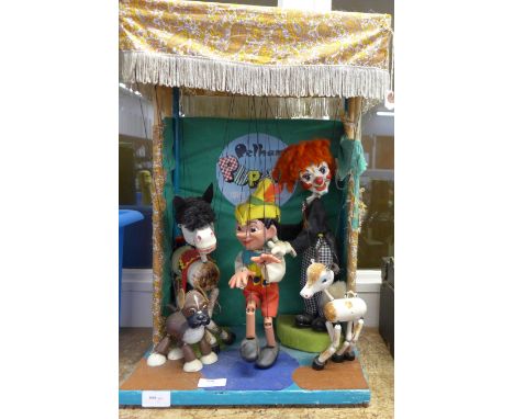 A Pelham Puppet theatre display with five Pelham puppets 