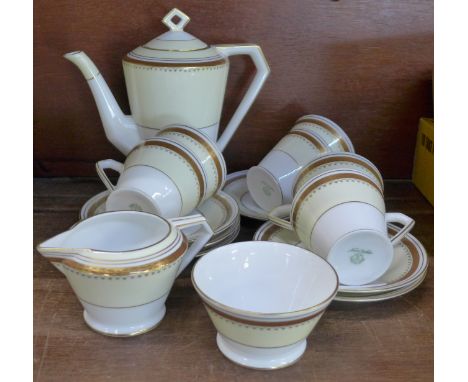 A Noritake Art Deco 15 piece coffee service in cream/white with gilding, circa 1910, one cup with hairline crack 