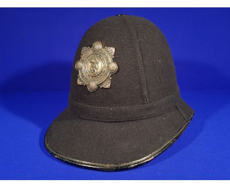 1950'S GARDA SIOCHANA HELMET   £100-£200