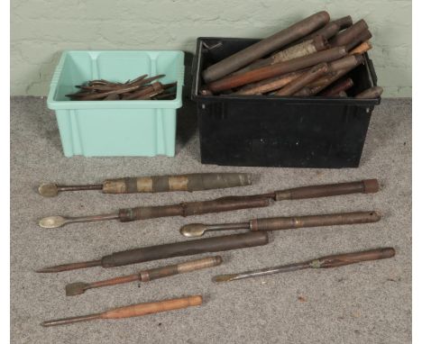 Two boxes of wood turning lathe tools.  Some examples loose from handles and splits to the wood.