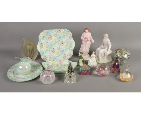 A collection of ceramics and glassware to include three Shelley Melody pattern plates, paperweights including Caithness examp