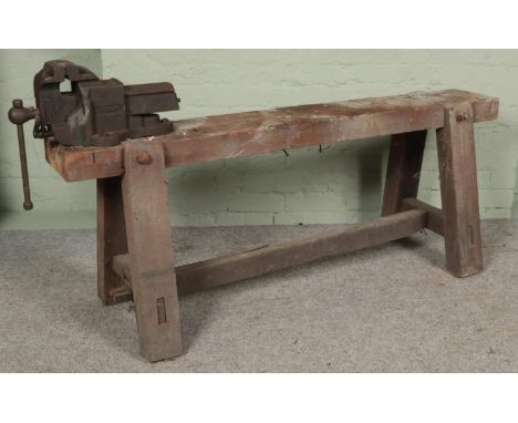 A work bench with attached Paramo quick releasing vice.  