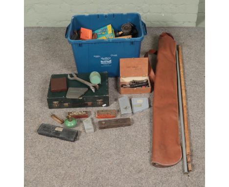 A box of assorted tools to include spirit levels, drill bits, wrenches, etc.  