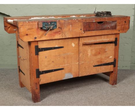 A work bench with cupboard base and Paramo vice. (87cm x 138cm x 61cm)  