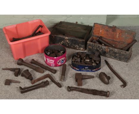 A large collection of metal tools and tool accessories.  