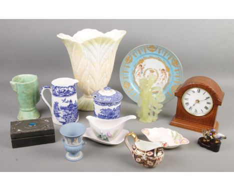 A quantity of mostly ceramics. Includes Royal Crown Derby Old Imari jug, Wedgwood jasperware, mantel clock, Beswick vase, blu