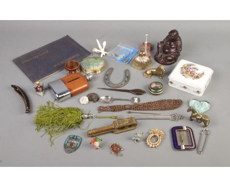 A tray of assorted collectables to include magnifying glass, brass miniatures, hip flask, belt buckle, etc.  