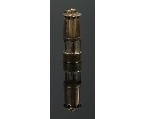 A 9ct Gold charm, in the form of a miners lamp. Assayed in Birmingham by W H Collins &amp; Co. Total weight: 2.4g  