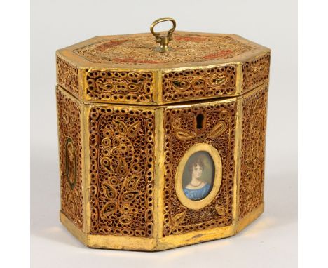 A GOOD REGENCY ROLLED PAPER OCTAGONAL TEA CADDY with a miniature of a young girl. 11cms high.