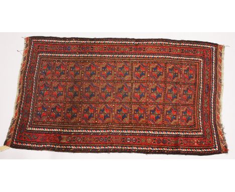 A PERSIAN BOKHARA TYPE CARPET, claret ground, three rows of ten gulls. 210cms x 118cms.
