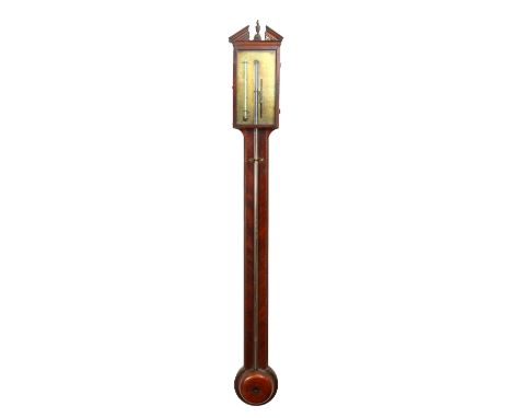 A GEORGE III MAHOGANY STICK BAROMETER by B. GATTY, READING, with brass face. 37ins long.