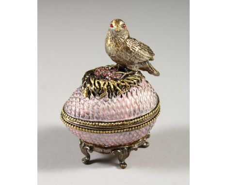 A SMALL ENAMEL EGG BOX. 9cms high.