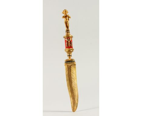 A RUSSIAN SILVER GILT AND ENAMEL LETTER OPENER, with cherb finial and feather shaped blade. 26.5cms long.