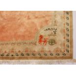 A LARGE CHINESE CARPET, plain salmon ground, the borders having horse and chariot motifs to each