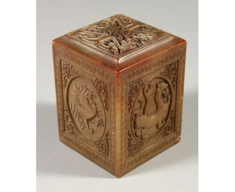 A CHINESE SQUARE CARVED SOAPSTONE SEAL. 8cms high.