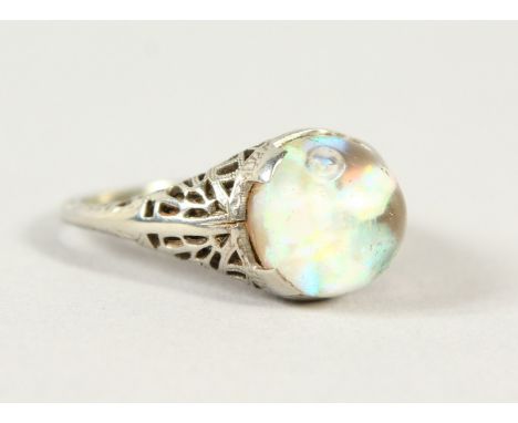 AN UNUSUAL 18K WHITE GOLD AND OPAL RING.