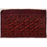A SMALL BOKHARA RUG / HANGING, claret ground with four rows of six gulls. 135cms x 75cms.