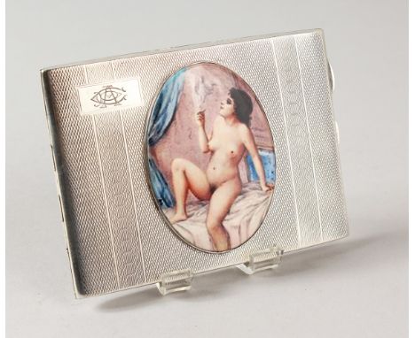 AN ENGINE TURNED SILVER CIGARETTE CASE, Birmingham 1928, the lid with a nude.