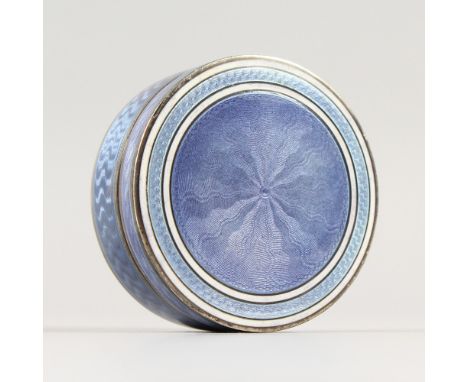 A SILVER AND BLUE ENAMEL PILL BOX. Engraved Dita, February 27th 1922. 5cms diameter.