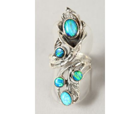 A SILVER AND REAL OPAL RING.