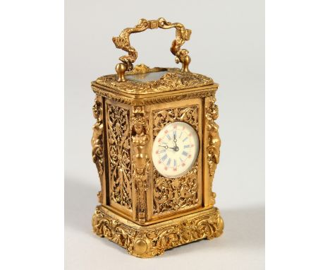 A MINIATURE FRENCH ORNATE BRASS CARRIAGE TYPE CLOCK, the sides with caryatid figures.