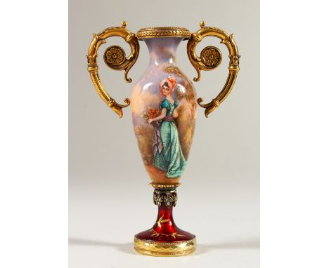 A RUSSIAN SILVER GILT AND ENAMEL DECORATED TWIN HANDLED PEDESTAL VASE, decorated with a young lady in a landscape. 11cms high