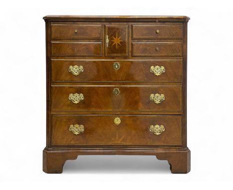 Late 20th century walnut veneered television chest in Georgian style, rectangular top over simulated drawer front with centra