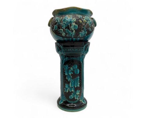Late 19th century Majolica jardinière on pedestal stand, bowl with scalloped rim, applied handle to either side, the whole gl