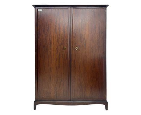 Stag Minstrel - mahogany double wardrobes, comprising a larger wardrobe with a shelf and hanging rail behind two panelled doo