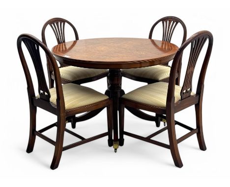 Ian Smith Furniture - Georgian design walnut centre table, the circular banded top with fluted edge, supported by a turned pe