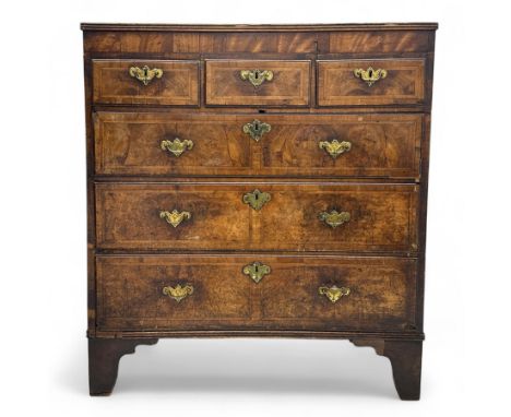 18th century and later walnut and mahogany feather-banded chest on later bracket feet, the rectangular top with reeded edge a