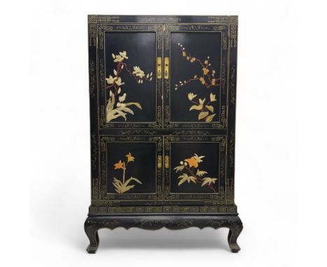 Late 20th century Chinoiserie black lacquer cabinet, the rectangular body decorated with hand-painted floral and foliate moti