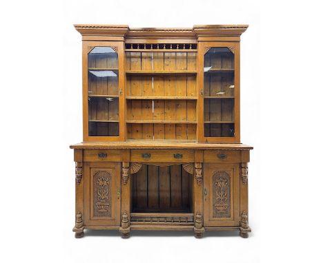 Late 19th century pine dresser, the projecting cornice with dentil and spindle moulded frieze above a three-tier plate shelve