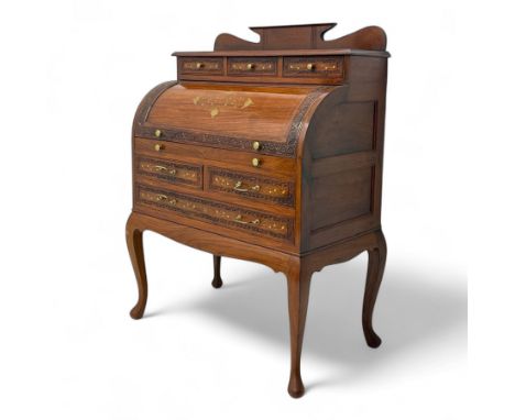 Eastern inlaid hardwood cylinder top bureau desk, the upper section with shaped back and three short drawers, the roll-top de