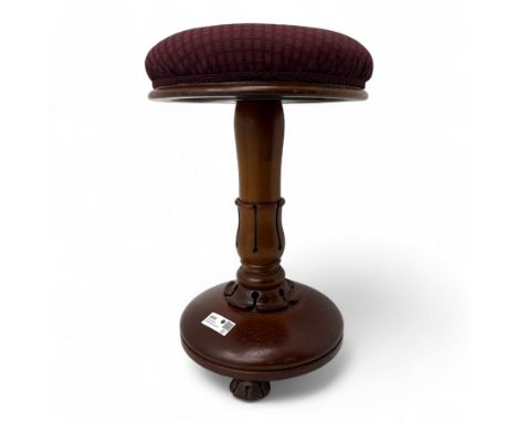 William IV mahogany revolving piano stool, circular padded seat upholstered in burgundy patterned fabric, turned and waisted 