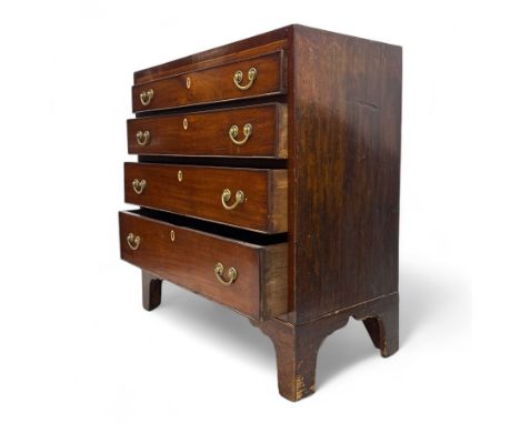19th-century mahogany chest of drawers, rectangular crossbanded top fitted with three long graduated drawers with ivory escut