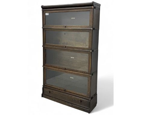 Globe Wernicke - stacking sectional library bookcase, over four glazed up-and-over doors, each bearing original makers mark, 