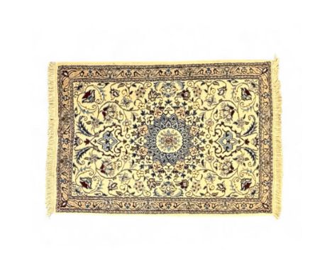 Group of five mid to late 20th century Oriental style wool rugs, comprising Persian-inspired floral examples and Turkoman Bok