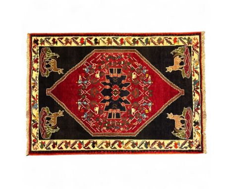 Southwestern Persian Qashqai pictorial rug, hand knotted large central medallion on crimson ground, richly decorated with sty