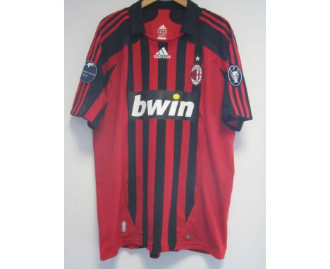 PAULO MALDINI AC MILAN PLAYER ISSUE SHIRT     A red and black striped short sleeve shirt with Maldini 3 on the back and signe
