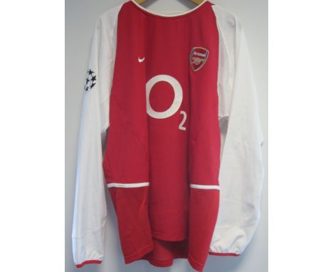 DENNIS BERGKAMP ARSENAL MATCH ISSUE / WORN SHIRT         A red with white long sleeves shirt with Bergkamp 10 on the back and